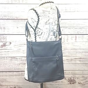 the sak blue pebbled leather crossbody